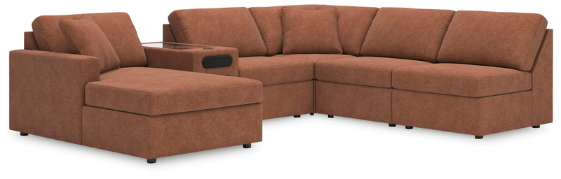Ashley Furniture Modmax sectional with chaise, featuring a modern design, plush cushioning, and neutral fabric upholstery.