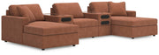 Ashley Furniture Modmax double chaise sectional with integrated audio consoles, featuring plush cushions and modern design.
