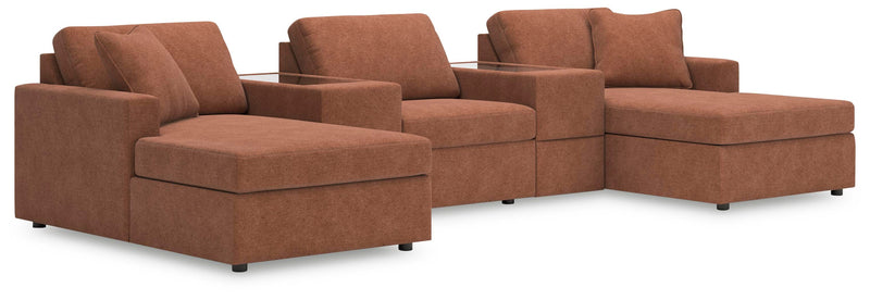 Ashley Furniture Modmax Pit Sectional sofa with plush cushions and modern design, shown in a stylish living room setting.