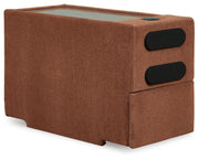 Ashley Furniture Modmax balanced sectional with built-in audio and storage consoles, shown from an angled closed view.