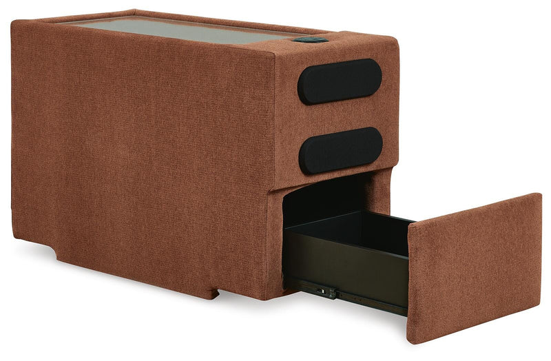 Ashley Furniture Modmax sectional with built-in audio system, storage consoles, and open-angle design for modern living spaces.