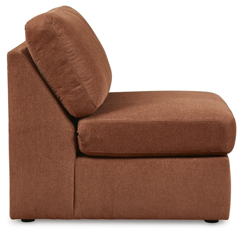 Ashley Furniture Modmax 6-Piece Sectional with plush cushions and modern design, shown from a side view in a stylish living room setting.