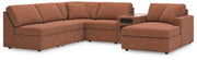 Ashley Furniture Modmax sectional with chaise, featuring modern design and plush cushions in a stylish living room setup.