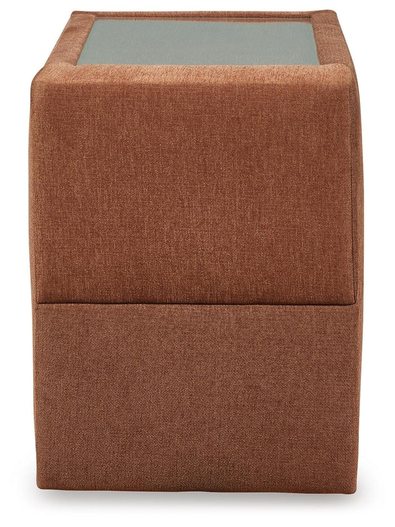 Ashley Furniture Modmax sectional with built-in audio, storage consoles, and modern design, shown in a head-on view.