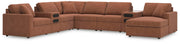 Ashley Furniture Modmax sectional with audio system and chaise, showcasing plush upholstery and modern design in a cozy living room setting.