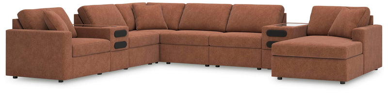 Ashley Furniture Modmax sectional with audio system and chaise, showcasing plush upholstery and modern design in a cozy living room setting.