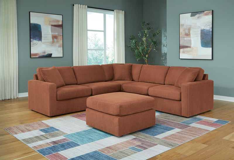 Ashley Furniture Modmax living room set with sofa and armchair, upholstered in neutral fabric, modern design for stylish living spaces.