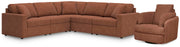 Ashley Furniture Modmax living room set with sofa and armchair, beige upholstery, modern design, and wooden legs.