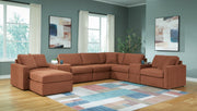 Ashley Furniture Modmax living room set with sofa, loveseat, and armchair featuring modern upholstery and sleek design.