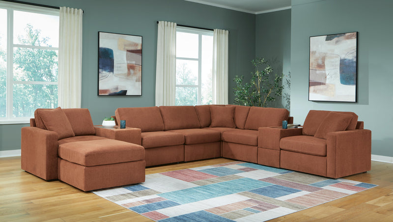 Ashley Furniture Modmax living room set with sofa, loveseat, and armchair featuring modern upholstery and sleek design.