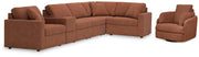 Ashley Furniture Modmax living room set featuring a sofa and loveseat with modern upholstery and sleek design.