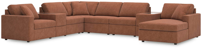 Ashley Furniture Modmax sectional with chaise, shown in a modern fabric design, featuring plush cushions and a spacious layout.