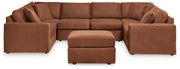 Ashley Furniture Modmax living room set featuring a sofa and matching armchair with modern upholstery and sleek design.