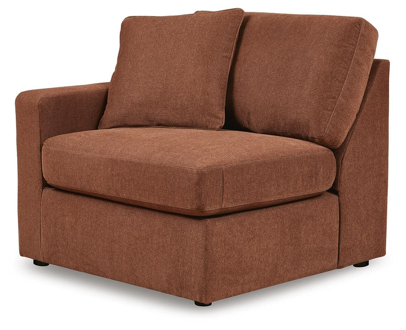 Ashley Furniture Modmax balanced sectional with built-in audio and storage consoles, shown from an angled view.