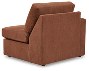 Ashley Furniture Modmax sectional with built-in audio and storage consoles, featuring balanced design and plush upholstery.