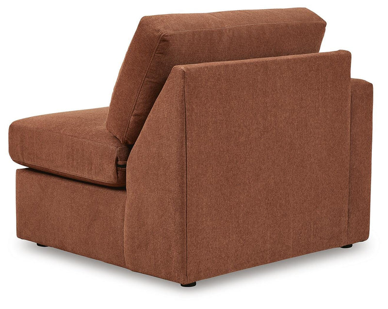 Ashley Furniture Modmax sectional with built-in audio and storage consoles, featuring balanced design and plush upholstery.
