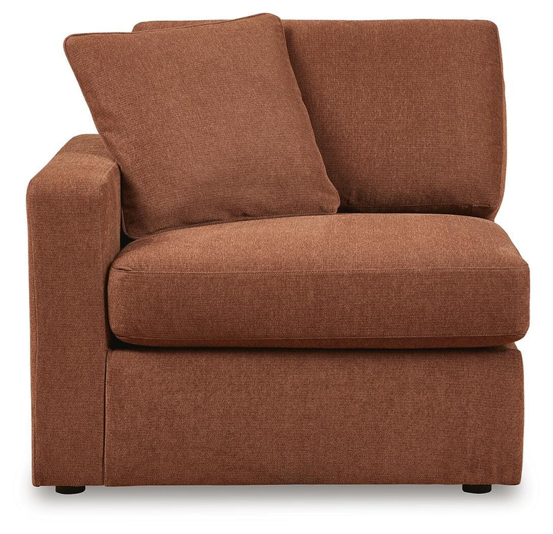 Ashley Furniture Modmax sectional with built-in audio, storage consoles, and plush seating, shown from a head-on angle.