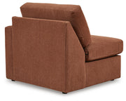 Ashley Furniture Modmax sectional with integrated audio and storage consoles, featuring a modern design and plush seating.
