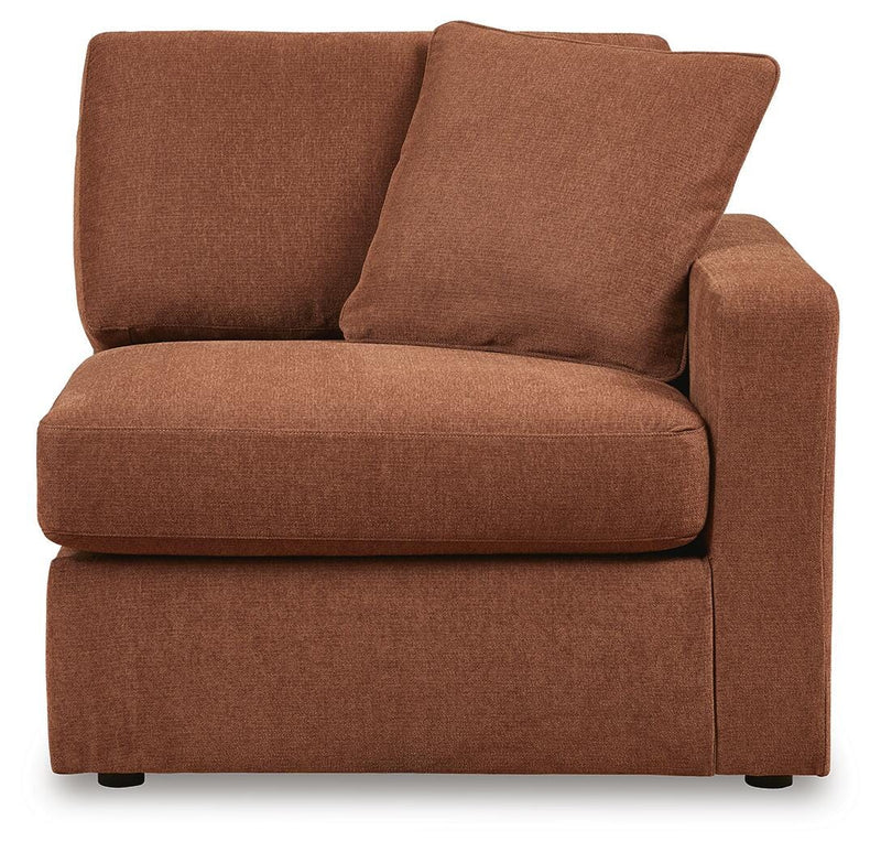 Ashley Furniture Modmax sectional with built-in audio, storage consoles, and modern design, shown from a head-on angle.