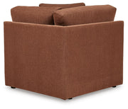 Ashley Furniture Modmax sectional sofa with built-in audio and storage consoles, showing the back view with plush cushions and modern design.