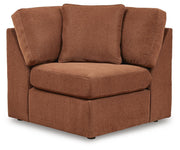 Ashley Furniture Modmax sectional with built-in audio and storage consoles, featuring modern design and plush seating.