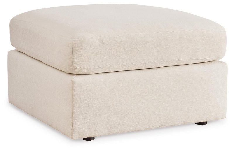Ashley Furniture Modmax living room set with sofa and armchair in a modern design, shown from an angled side view.