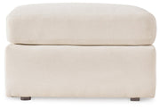 Ashley Furniture Modmax living room set featuring a sofa and armchair with plush cushions and contemporary design.