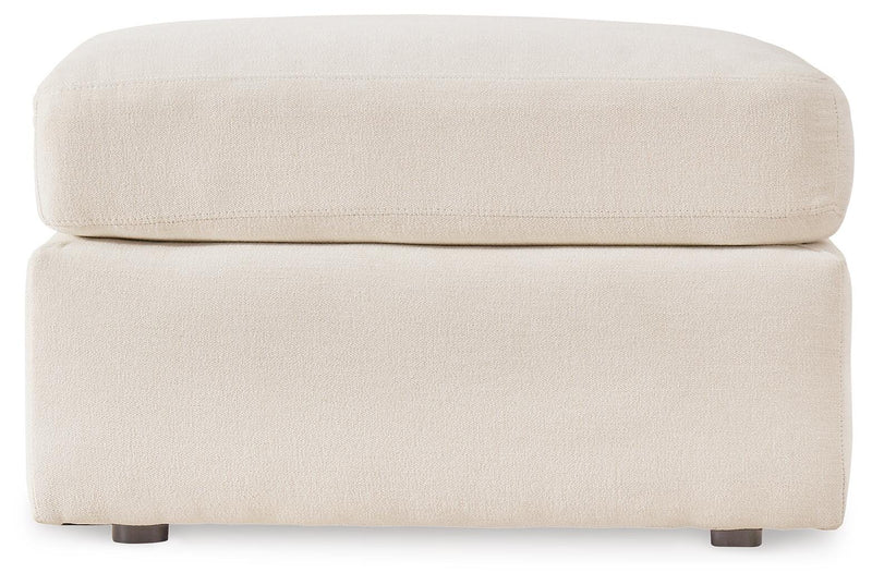 Ashley Furniture Modmax living room set featuring a sofa and armchair with plush cushions and contemporary design.
