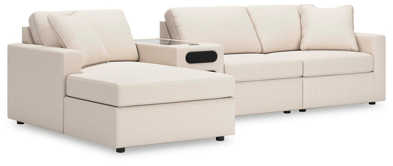 Ashley Furniture Modmax sectional with chaise, featuring modern design and plush upholstery, shown in a spacious living room setting.