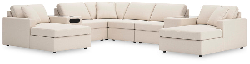 Ashley Furniture Modmax sectional with chaise, featuring modern design and plush cushions, shown from a front angle.