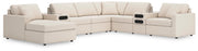 Ashley Furniture Modmax sectional with integrated audio system and chaise, featuring modern design and plush cushions.