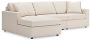 Ashley Furniture Modmax sectional with chaise, featuring modern design, plush upholstery, and multiple seating areas.
