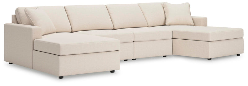 Ashley Furniture Modmax sectional with chaise, showing modern fabric upholstery and plush cushions in a stylish living room setting.