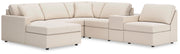 Ashley Furniture Modmax sectional with chaise, featuring plush fabric upholstery and modern design, shown with a spacious configuration.