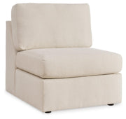 Ashley Furniture Modmax sectional with chaise, showing a modern L-shaped sofa with plush cushions and fabric upholstery in an angled view.