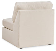 Ashley Furniture Modmax sectional with built-in audio and storage consoles, featuring plush cushions and modern design.