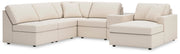 Ashley Furniture Modmax sectional with chaise, featuring plush upholstery and a modern design, shown in a stylish living room setting.