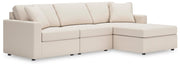 Ashley Furniture Modmax sectional with chaise, featuring modern upholstery and plush cushions, shown in a stylish living room setting.