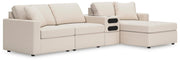 Ashley Furniture Modmax sectional with chaise, featuring plush cushions and contemporary design in a neutral fabric.