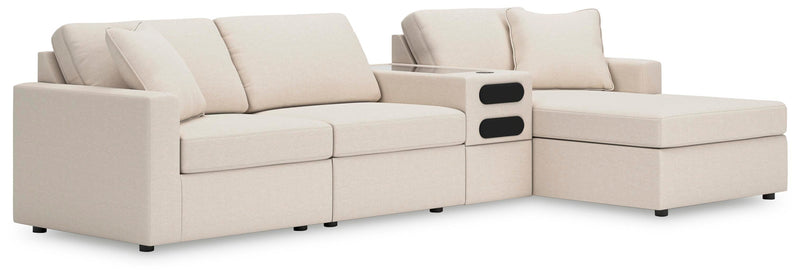 Ashley Furniture Modmax sectional with chaise, featuring plush cushions and contemporary design in a neutral fabric.
