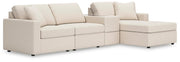 Ashley Furniture Modmax sectional with chaise in a modern design, featuring plush cushions and a neutral fabric finish.