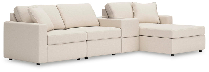 Ashley Furniture Modmax sectional with chaise in a modern design, featuring plush cushions and a neutral fabric finish.