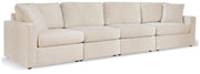 Ashley Furniture Modmax living room set featuring a sofa, loveseat, and armchair with modern upholstery and stylish design
