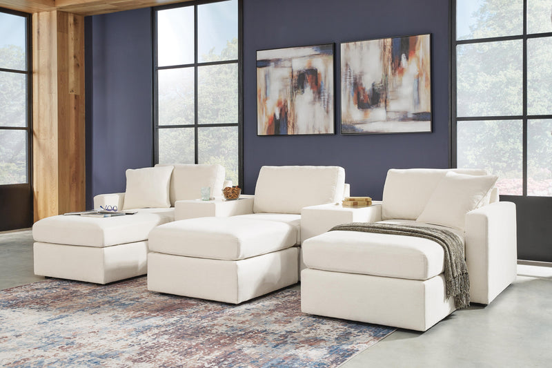 Ashley Furniture Modmax living room set with sofa and armchair in a modern design, featuring neutral upholstery and stylish cushions.