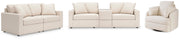 Ashley Furniture Modmax living room set featuring a sofa, armchair, and coffee table in a modern living room setting.