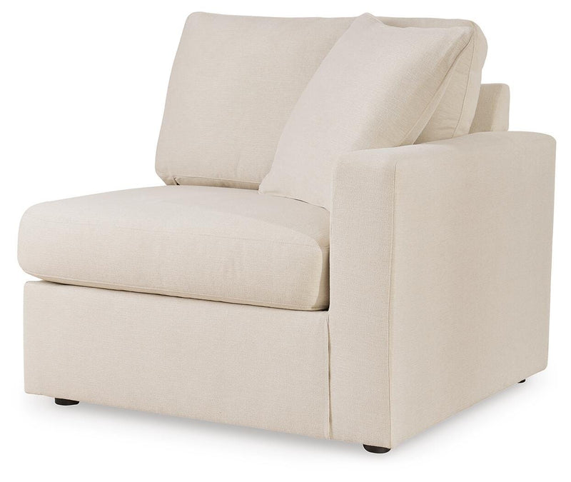 Ashley Furniture Modmax sectional with integrated audio and storage consoles, featuring a modern, balanced design and angled view.
