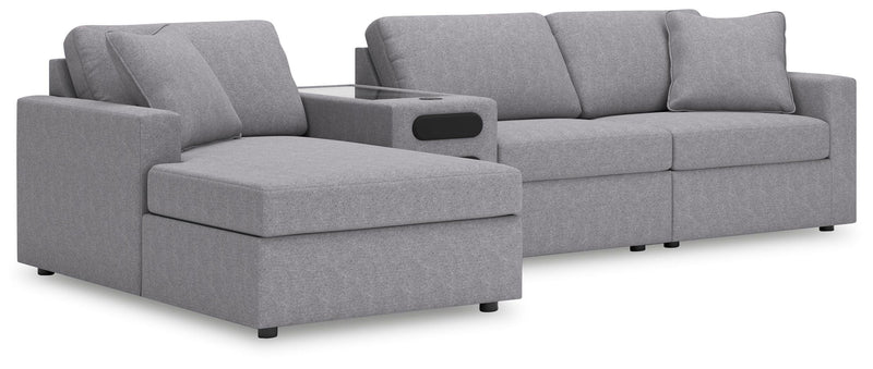 Ashley Furniture Modmax sectional with chaise, featuring modern design, plush cushions, and neutral fabric upholstery.