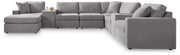 Ashley Furniture Modmax sectional with chaise, featuring plush fabric, modern design, and multiple cushions for comfortable seating.