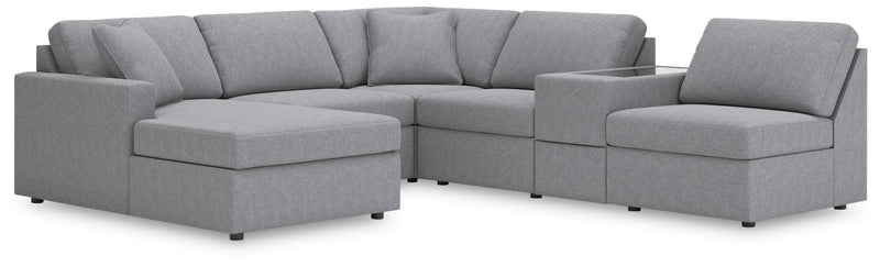 Ashley Furniture Modmax sectional with chaise, featuring plush cushions and modern design, shown in a stylish living room setup.