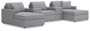 Ashley Furniture Modmax Pit Sectional sofa with modern design, featuring plush cushions and a sleek, contemporary style.